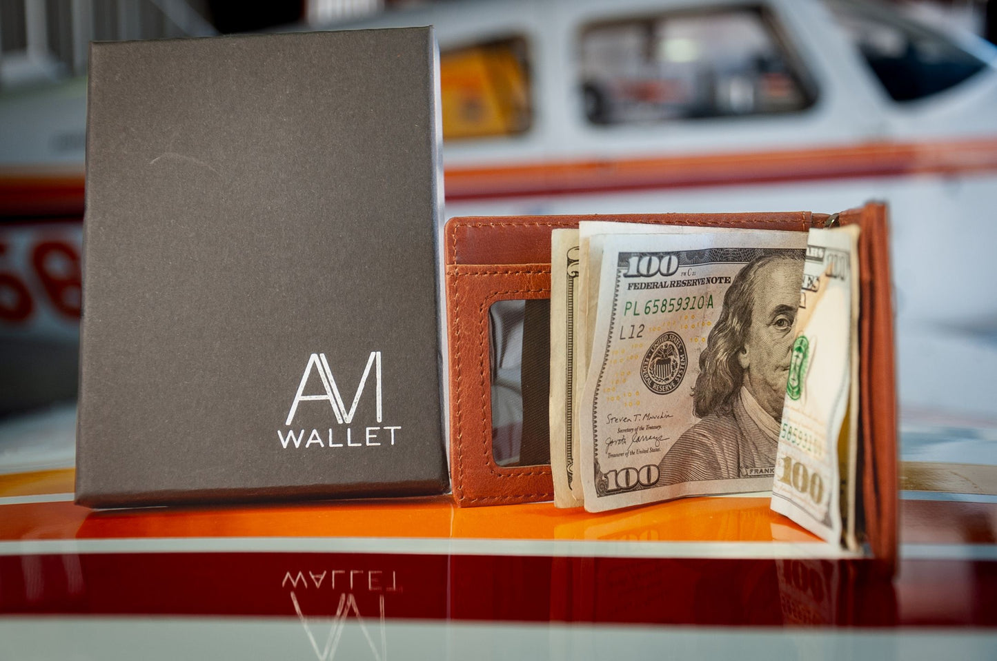 Slim leather front pocket wallet holding cards and cash