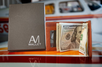 Slim leather front pocket wallet holding cards and cash